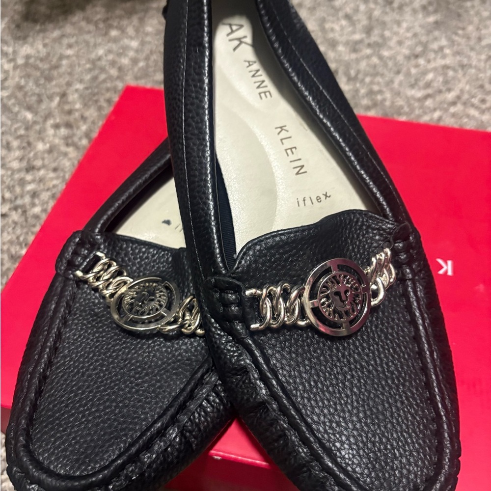 Anne Klein Black Pebbled Leather Loafers with Gold-Tone Chain